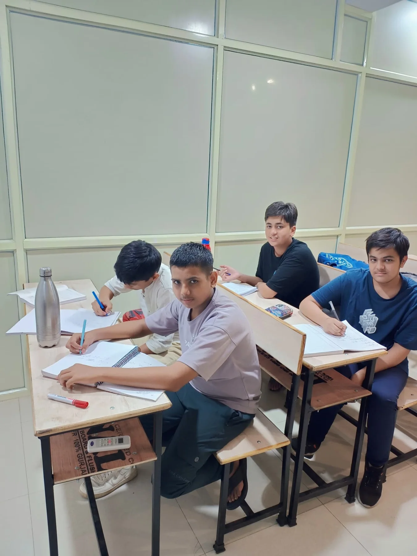 Students studying in a real Sarthak Academy classroom