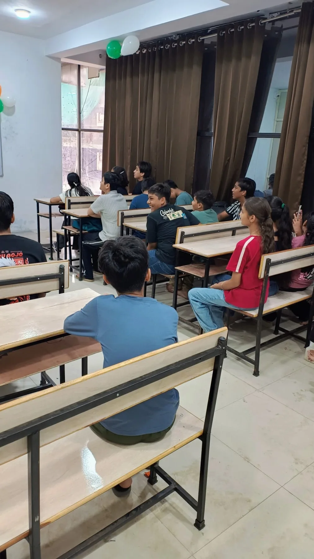 Students learning inside a real Sarthak Academy classroom